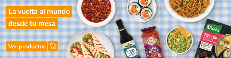 Banner de cocina internacional con el mensaje "La vuelta al mundo desde tu mesa". Selección de platos y productos de diferentes gastronomías del mundo, con sushi, noodles orientales, chili con carne, tacos, guacamole, salsa tikka masala, salsa de ostras y sopa thai. Botón "Ver productos".