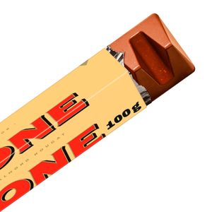 Segunda imagen del producto Barrita Chocolate Leche Con Miel  y Almendras de la marca TOBLERONE
